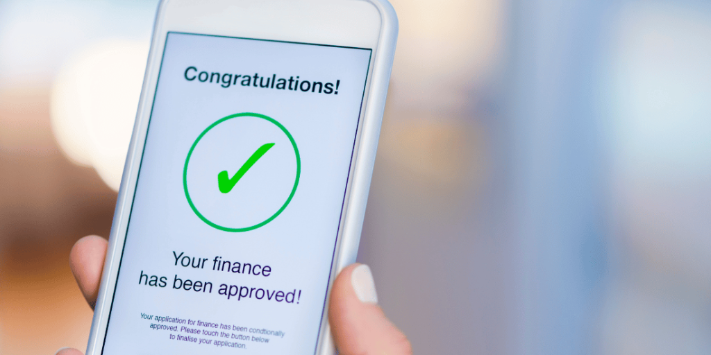 mobile phone showing an approved business loan to cover LLP income tax in the UK